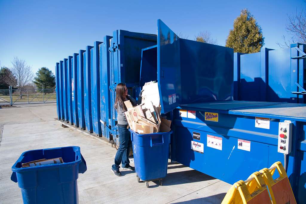 How should trash and recyclables be stored